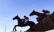 18 March 2022; A Plus Tard, with Rachael Blackmore up, left, leads eventual second placed Minella Indo, with Robbie Power up, over the last on their way to winning the Boodles Cheltenham Gold Cup Chase during day four of the Cheltenham Racing Festival at Prestbury Park in Cheltenham, England. Photo by David Fitzgerald/Sportsfile