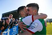 18 March 2022; Barry Coffey of Cork City, right, celebrates after scoring his side's first goal with team-mate Aaron Bolger during the SSE Airtricity League First Division match between Treaty United and Cork City at Markets Field in Limerick. Photo by Michael P Ryan/Sportsfile