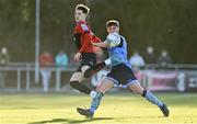 18 March 2022; Stephen Mallon of Bohemians flicks the ball over Alex Dunne of UCD during the SSE Airtricity League Premier Division match between UCD and Bohemians at UCD Bowl in Belfield, Dublin. Photo by Brendan Moran/Sportsfile