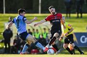 18 March 2022; Jordan Flores of Bohemians in action against Liam Kerrigan of UCD during the SSE Airtricity League Premier Division match between UCD and Bohemians at UCD Bowl in Belfield, Dublin. Photo by Brendan Moran/Sportsfile