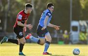 18 March 2022; Liam Kerrigan of UCD in action against Dawson Devoy of Bohemians during the SSE Airtricity League Premier Division match between UCD and Bohemians at UCD Bowl in Belfield, Dublin. Photo by Brendan Moran/Sportsfile