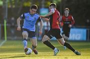 18 March 2022; Liam Kerrigan of UCD in action against Jordan Flores of Bohemians  during the SSE Airtricity League Premier Division match between UCD and Bohemians at UCD Bowl in Belfield, Dublin. Photo by Brendan Moran/Sportsfile