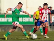 18 March 2022; Mark O'Mahony of Cork City in action against Callum McNamara of Treaty United during the SSE Airtricity League First Division match between Treaty United and Cork City at Markets Field in Limerick. Photo by Michael P Ryan/Sportsfile