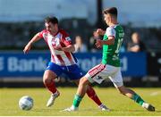 18 March 2022; Joel Coustrain of Treaty United in action against Barry Coffey during the SSE Airtricity League First Division match between Treaty United and Cork City at Markets Field in Limerick. Photo by Michael P Ryan/Sportsfile
