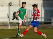 18 March 2022; Aaron Bolger of Cork City in action against Callum McNamara of Treaty United during the SSE Airtricity League First Division match between Treaty United and Cork City at Markets Field in Limerick. Photo by Michael P Ryan/Sportsfile