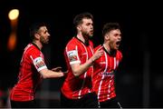 18 March 2022; Will Patching of Derry City, centre, celebrates after scoring his side's first goal with Daniel Lafferty, left, and Cameron McJannet, right, during the SSE Airtricity League Premier Division match between Derry City and St Patrick's Athletic at The Ryan McBride Brandywell Stadium in Derry. Photo by Stephen McCarthy/Sportsfile