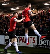 18 March 2022; Will Patching of Derry City, right, celebrates after scoring his side's first goal with team-mate Cameron McJannet, left, during the SSE Airtricity League Premier Division match between Derry City and St Patrick's Athletic at The Ryan McBride Brandywell Stadium in Derry. Photo by Stephen McCarthy/Sportsfile