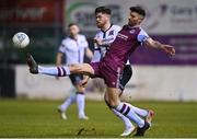 18 March 2022; Adam Foley of Drogheda United in action against Sam Bone of Dundalk during the SSE Airtricity League Premier Division match between Drogheda United and Dundalk at Head in the Game Park in Drogheda, Louth. Photo by Ramsey Cardy/Sportsfile