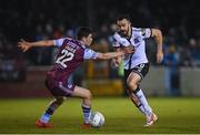 18 March 2022; Robbie Benson of Dundalk in action against James Clarke of Drogheda United during the SSE Airtricity League Premier Division match between Drogheda United and Dundalk at Head in the Game Park in Drogheda, Louth. Photo by Ramsey Cardy/Sportsfile