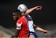 18 March 2022; James Akintunde of Derry City in action against Tom Grivosti of St Patrick's Athletic during the SSE Airtricity League Premier Division match between Derry City and St Patrick's Athletic at The Ryan McBride Brandywell Stadium in Derry. Photo by Stephen McCarthy/Sportsfile