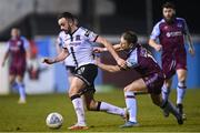 18 March 2022; Robbie Benson of Dundalk in action against Dane Massey of Drogheda United during the SSE Airtricity League Premier Division match between Drogheda United and Dundalk at Head in the Game Park in Drogheda, Louth. Photo by Ramsey Cardy/Sportsfile