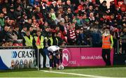 18 March 2022; A can is thrown from the stand as Chris Forrester of St Patrick's Athletic prepares to take a corner during the SSE Airtricity League Premier Division match between Derry City and St Patrick's Athletic at The Ryan McBride Brandywell Stadium in Derry. Photo by Stephen McCarthy/Sportsfile