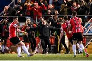 18 March 2022; Derry City manager Ruaidhrí Higgins, his staff, bench and supporters celebrate after Will Patching scored their winning goal during the SSE Airtricity League Premier Division match between Derry City and St Patrick's Athletic at The Ryan McBride Brandywell Stadium in Derry. Photo by Stephen McCarthy/Sportsfile