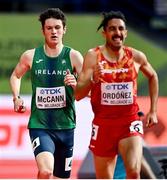 19 March 2022; Luke McCann of Ireland, left, trails Saul Ordonez of Spain in their heat of the men's 1500m during day two of the World Indoor Athletics Championships at the Stark Arena in Belgrade, Serbia. Photo by Sam Barnes/Sportsfile