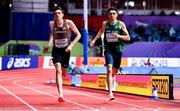 19 March 2022; Cameron Proceviat of Canada, left, and Andrew Coscoran of Ireland cross the line in their heat of the men's 1500m during day two of the World Indoor Athletics Championships at the Stark Arena in Belgrade, Serbia. Photo by Sam Barnes/Sportsfile