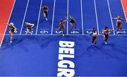 19 March 2022; Cyréna Samba-Mayela of France wins her heat of the women's 60m hurdles from Ditaji Kambundji of Switzerland, second from right, and Sarah Lavin of Ireland, left, during day two of the World Indoor Athletics Championships at the Štark Arena in Belgrade, Serbia. Photo by Sam Barnes/Sportsfile