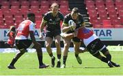 19 March 2022; Chris Farrell of Munster, second from right, supported by team-mate Liam Coombes, in action against Burger Odenndaal, right, and Wandisile Simelane, left, of Emirates Lions during the United Rugby Championship match between Emirates Lions and Munster at Emirates Airline Park in Johannesburg, South Africa. Photo by Sydney Seshibedi/Sportsfile