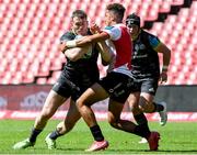 19 March 2022; Chris Farrell of Munster in action against Jordan Hendrikse of Emirates Lions during the United Rugby Championship match between Emirates Lions and Munster at Emirates Airline Park in Johannesburg, South Africa. Photo by Sydney Seshibedi/Sportsfile