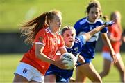 19 March 2022; Blaithin Mackin of Armagh in action against Shifra Havill of Laois during the Lidl Ladies Football National League Division 2 Semi-Final match between Armagh and Laois at O'Raghallaigh's GAA Club in Drogheda, Louth. Photo by Oliver McVeigh/Sportsfile