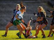 19 March 2022; Niamh O'Sullivan  of Meath in action against Eilis Ronayne, right, and Fiona McHale of Mayo, 6, during the Lidl Ladies Football National League Division 1 Semi-Final match between Mayo and Meath at St Tiernach's Park in Clones, Monaghan. Photo by Ray McManus/Sportsfile