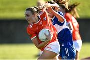19 March 2022; Cait Towe of Armagh in action against Mo Nerney of Laois during the Lidl Ladies Football National League Division 2 Semi-Final match between Armagh and Laois at O'Raghallaigh's GAA Club in Drogheda, Louth. Photo by Oliver McVeigh/Sportsfile