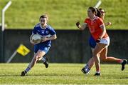 19 March 2022; Laura-Marie Maher of Laois in action against Tiarna Grimes of Armagh during the Lidl Ladies Football National League Division 2 Semi-Final match between Armagh and Laois at O'Raghallaigh's GAA Club in Drogheda, Louth. Photo by Oliver McVeigh/Sportsfile