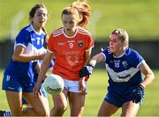 19 March 2022; Blaithin Mackin of Armagh in action against Shifra Havill of Laois during the Lidl Ladies Football National League Division 2 Semi-Final match between Armagh and Laois at O'Raghallaigh's GAA Club in Drogheda, Louth. Photo by Oliver McVeigh/Sportsfile