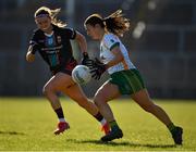 19 March 2022; Emma Troy of Meath in action against Saoirse Lally of Mayo during the Lidl Ladies Football National League Division 1 Semi-Final match between Mayo and Meath at St Tiernach's Park in Clones, Monaghan. Photo by Ray McManus/Sportsfile