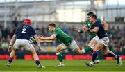19 March 2022; Garry Ringrose of Ireland in action against George Turner, left, and Stuart Hogg of Scotland during the Guinness Six Nations Rugby Championship match between Ireland and Scotland at Aviva Stadium in Dublin. Photo by Ramsey Cardy/Sportsfile