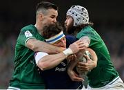 19 March 2022; Hamish Watson of Scotland is tackled by Jonathan Sexton, left, and Mack Hansen of Ireland during the Guinness Six Nations Rugby Championship match between Ireland and Scotland at Aviva Stadium in Dublin. Photo by Brendan Moran/Sportsfile
