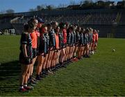 19 March 2022; The Mayo players stand during a minutes silence to honour the late Tom Madigan, who had been a member of the Old Mill and St. Senans clubs in Limerick before the Lidl Ladies Football National League Division 1 Semi-Final match between Mayo and Meath at St Tiernach's Park in Clones, Monaghan. Photo by Ray McManus/Sportsfile