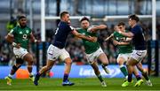 19 March 2022; Hugo Keenan of Ireland is tackled by Chris Harris of Scotland during the Guinness Six Nations Rugby Championship match between Ireland and Scotland at the Aviva Stadium in Dublin. Photo by Harry Murphy/Sportsfile