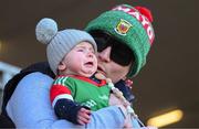 19 March 2022; Ronan Carey and his 6-month old daughter Anna, from Glencorrib, Mayo, before the Allianz Football League Division 1 match between Tyrone and Mayo at O'Neill's Healy Park in Omagh, Tyrone. Photo by Stephen McCarthy/Sportsfile