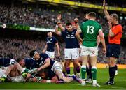 19 March 2022; Referee Wayne Barnes signals a try for Pierre Schoeman of Scotland during the Guinness Six Nations Rugby Championship match between Ireland and Scotland at Aviva Stadium in Dublin. Photo by Brendan Moran/Sportsfile