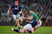 19 March 2022; Hugo Keenan of Ireland is tackled by Kyle Steyn of Scotland during the Guinness Six Nations Rugby Championship match between Ireland and Scotland at Aviva Stadium in Dublin. Photo by Brendan Moran/Sportsfile