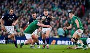 19 March 2022; Stuart Hogg of Scotland is tackled by Tadhg Furlong of Ireland during the Guinness Six Nations Rugby Championship match between Ireland and Scotland at Aviva Stadium in Dublin. Photo by Brendan Moran/Sportsfile