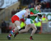 19 March 2022; Matthew Ruane of Mayo in action against Brian Kennedy of Tyrone during the Allianz Football League Division 1 match between Tyrone and Mayo at O'Neill's Healy Park in Omagh, Tyrone. Photo by Stephen McCarthy/Sportsfile