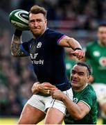 19 March 2022; Stuart Hogg of Scotland is tackled by James Lowe of Ireland during the Guinness Six Nations Rugby Championship match between Ireland and Scotland at the Aviva Stadium in Dublin. Photo by Harry Murphy/Sportsfile