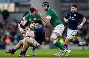 19 March 2022; Rory Darge of Scotland is tackled by Jonathan Sexton of Ireland during the Guinness Six Nations Rugby Championship match between Ireland and Scotland at Aviva Stadium in Dublin. Photo by Ramsey Cardy/Sportsfile