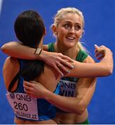 19 March 2022; Sarah Lavin of Ireland, right, is congratulated by Elisa Maria Di Lazzaro of Italy, left, after finishing second in her women's 60m hurdles semi-final with a new personal best of 7.97 seconds during day two of the World Indoor Athletics Championships at the Štark Arena in Belgrade, Serbia. Photo by Sam Barnes/Sportsfile