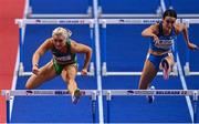 19 March 2022; Sarah Lavin of Ireland, left, on her way to finishing second in her women's 60m hurdles semi-final with a new personal best of 7.97 seconds, ahead of Elisa Maria Di Lazzaro of Italy, who finished sixth, during day two of the World Indoor Athletics Championships at the Štark Arena in Belgrade, Serbia. Photo by Sam Barnes/Sportsfile