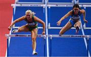 19 March 2022; Sarah Lavin of Ireland, left, on her way to finishing second in her women's 60m hurdles semi-final with a new personal best of 7.97 seconds, ahead of Elisa Maria Di Lazzaro of Italy, who finished sixth, during day two of the World Indoor Athletics Championships at the Štark Arena in Belgrade, Serbia. Photo by Sam Barnes/Sportsfile