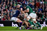 19 March 2022; Rory Darge of Scotland is tackled by Caelan Doris of Ireland during the Guinness Six Nations Rugby Championship match between Ireland and Scotland at Aviva Stadium in Dublin. Photo by Brendan Moran/Sportsfile