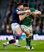 19 March 2022; Jack Conan of Ireland is tackled by Ali Price of Scotland during the Guinness Six Nations Rugby Championship match between Ireland and Scotland at Aviva Stadium in Dublin. Photo by Brendan Moran/Sportsfile
