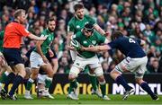 19 March 2022; Caelan Doris of Ireland is tackled by Jonny Gray of Scotland during the Guinness Six Nations Rugby Championship match between Ireland and Scotland at Aviva Stadium in Dublin. Photo by Brendan Moran/Sportsfile