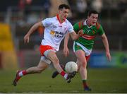 19 March 2022; Darragh Canavan of Tyrone in action against Stephen Coen of Mayo during the Allianz Football League Division 1 match between Tyrone and Mayo at O'Neill's Healy Park in Omagh, Tyrone. Photo by Stephen McCarthy/Sportsfile