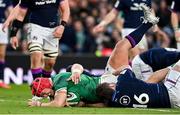 19 March 2022; Josh van der Flier of Ireland scores his side's third try despite the tackle of Pierre Schoeman and Fraser Brown of Scotland during the Guinness Six Nations Rugby Championship match between Ireland and Scotland at Aviva Stadium in Dublin. Photo by Brendan Moran/Sportsfile