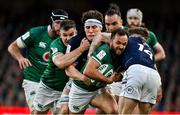 19 March 2022; Jamison Gibson Park of Ireland, supported by Jonathan Sexton, left, is tackled by Rory Darge and Darcy Graham of Scotland during the Guinness Six Nations Rugby Championship match between Ireland and Scotland at Aviva Stadium in Dublin. Photo by Brendan Moran/Sportsfile