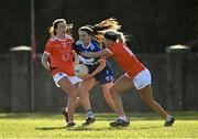19 March 2022; Erone Fitzpatrick of Laois in action against Tiarna Grimes and Fionnuala McKenna of Armagh during the Lidl Ladies Football National League Division 2 Semi-Final match between Armagh and Laois at O'Raghallaigh's GAA Club in Drogheda, Louth. Photo by Oliver McVeigh/Sportsfile