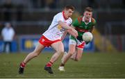 19 March 2022; Peter Harte of Tyrone in action against David McBrien of Mayo during the Allianz Football League Division 1 match between Tyrone and Mayo at O'Neill's Healy Park in Omagh, Tyrone. Photo by Stephen McCarthy/Sportsfile